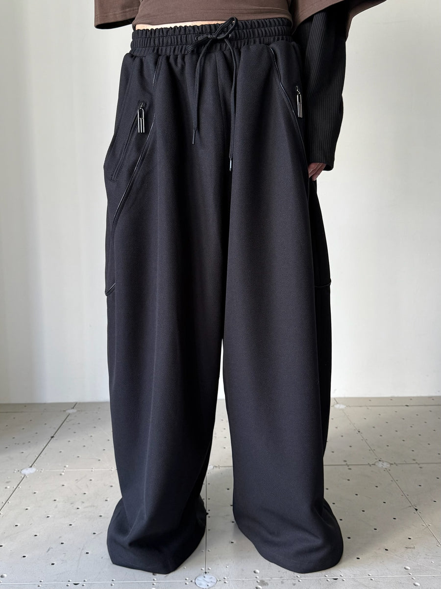 タグ付き【ka na ta】球体パンツ ブラック NAME SAKE YUTA PANELLED TRACK PANTS BLACK ネイムセイク 取扱